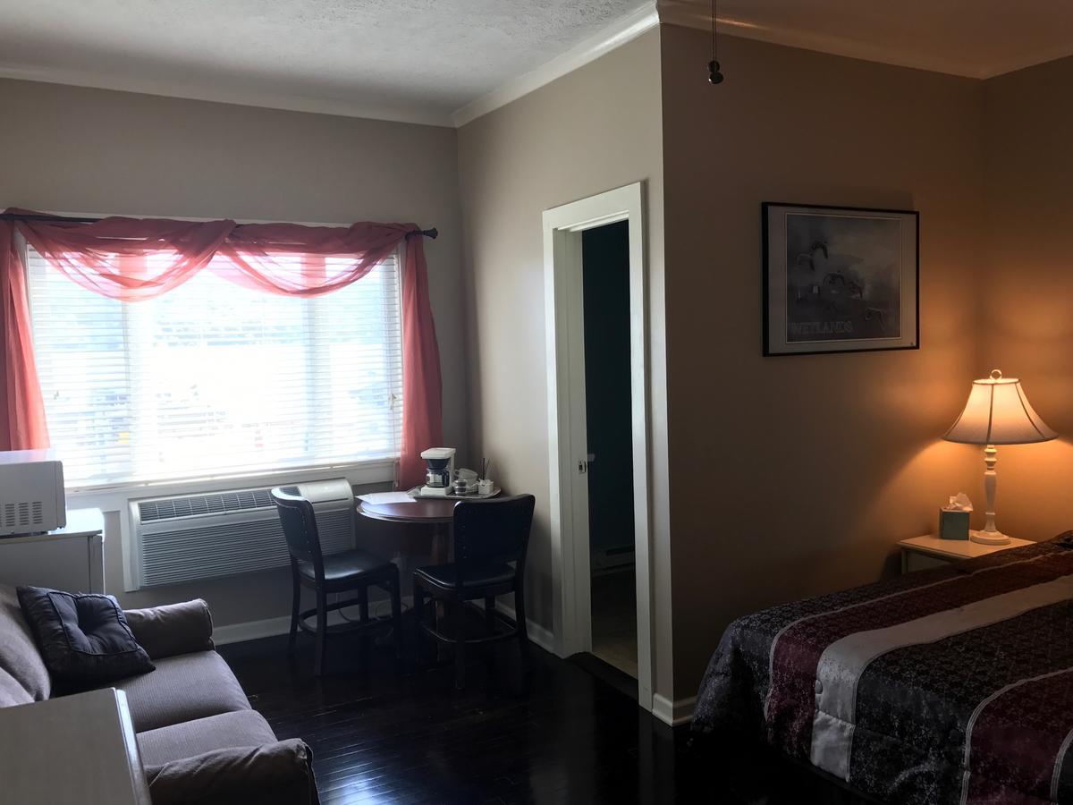 Beachcomber Inn Conesus Buitenkant foto